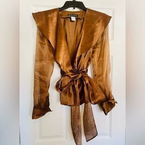 Cooper color dressy top with self bow around waist. Sheer sleeves. Size 10.